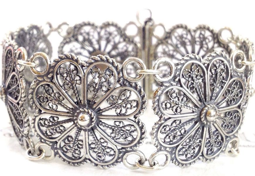 Filigreed silver